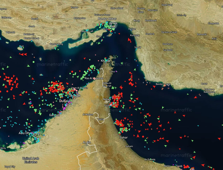 Why do some ships cross the Strait of Hormuz?