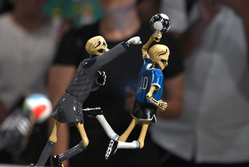 Mexican popular art dresses up as soccer for the 2026 World Cup with iconic figures and plays like the “hand of God”