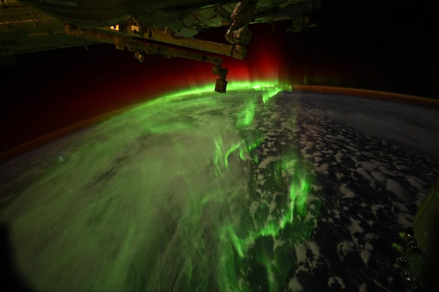 NASA images showing a green river of light winding over Earth