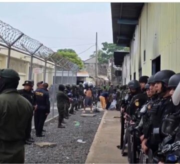 What is known about the riot and the transfer of prisoners from the Puerto Barrios Detention Center