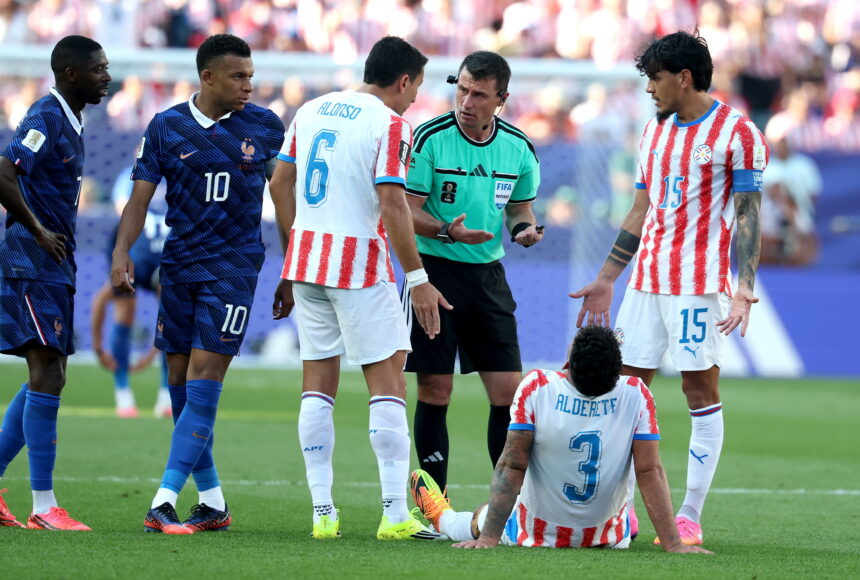 the oppressive heat that marks the duel between France and Paraguay